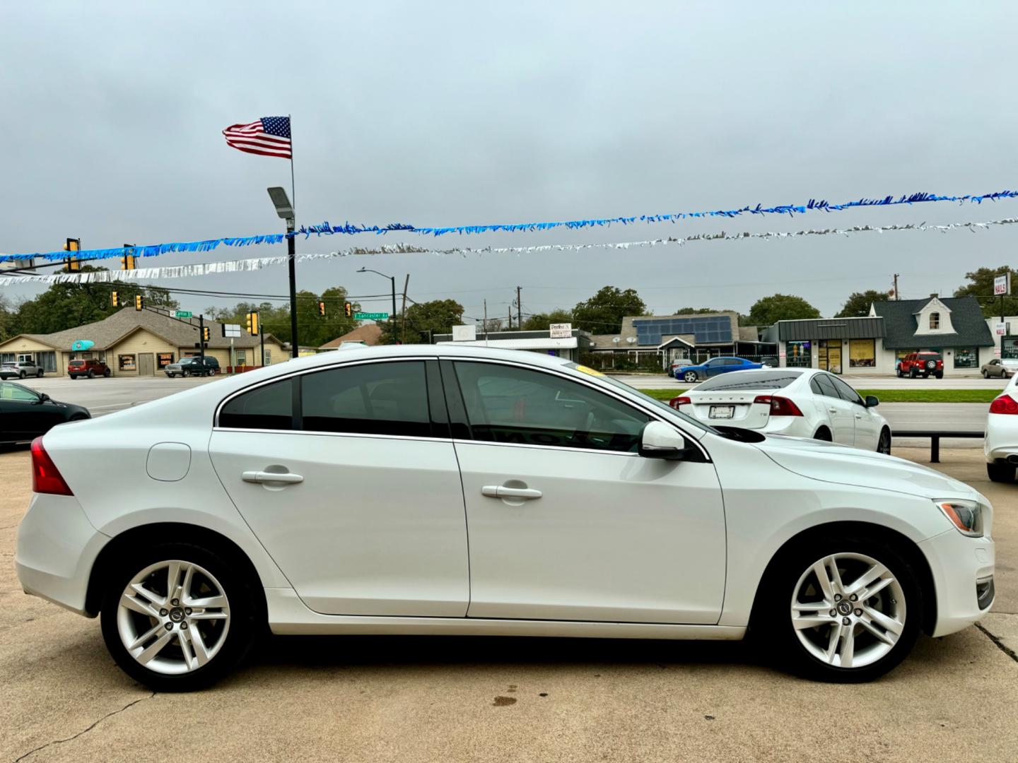 2015 WHITE VOLVO S60 PREMIER PLUS (YV140MFC3F1) , located at 5900 E. Lancaster Ave., Fort Worth, TX, 76112, (817) 457-5456, 0.000000, 0.000000 - This is a 2015 VOLVO S60 PREMIER PLUS 4 DOOR SEDAN that is in excellent condition. There are no dents or scratches. The interior is clean with no rips or tears or stains. All power windows, door locks and seats. Ice cold AC for those hot Texas summer days. It is equipped with a CD player, AM/FM radi - Photo#7